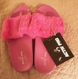 Slippers.  Pink furry slides